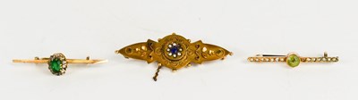 Lot 151 - A group of three brooches, including a seed...