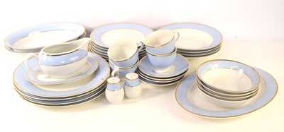 Lot 234 - A Doulton part dinner service, with pale blue...