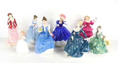 Lot 256 - A group of Royal Doulton figurines, comprising...