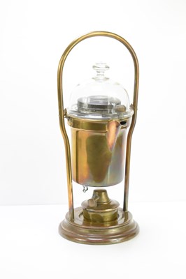 Lot 186 - A brass coffee maker, set on a gimble with...