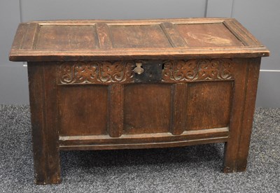 Lot 565 - An oak coffer, part 18th century, having three...