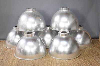 Lot 135 - A group of seven large polished aluminium...