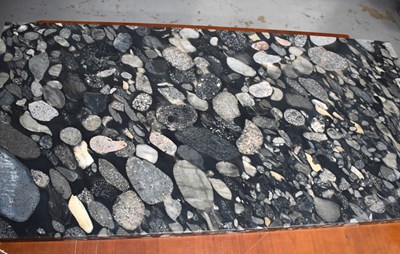 Lot 154 - A marble slab of pebble design, 59cm by 117cm...