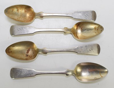 Lot 377 - Four silver teaspoons in the fiddle pattern,...