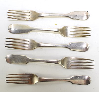 Lot 411 - Five Georgian and Victorian silver table forks...