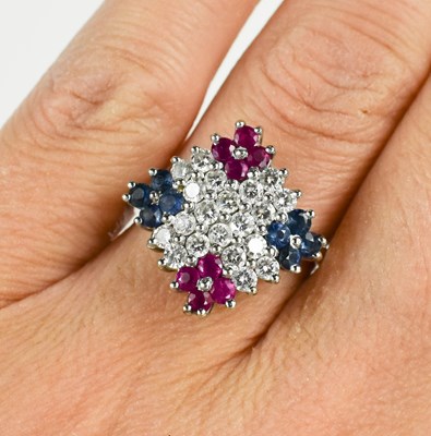 Lot 8 - An 18ct white gold diamond, sapphire and ruby...