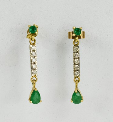 Lot 11 - A pair of 14ct gold, diamond and emerald drop...