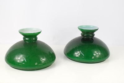 Lot 185 - Two green glass oil lamp shades.