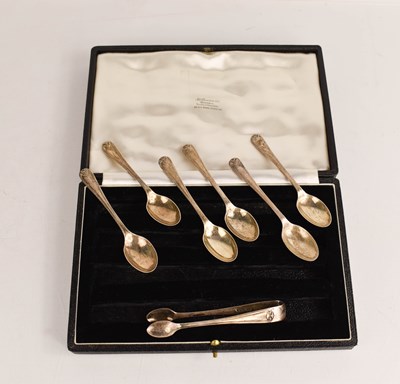 Lot 239 - A set of silver teaspoons, and a silver pair...