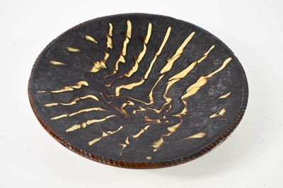 Lot 54 - A terracotta slipware bowl, with treacle...