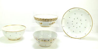 Lot 233 - A porcelain fluted bowl and matching plate...