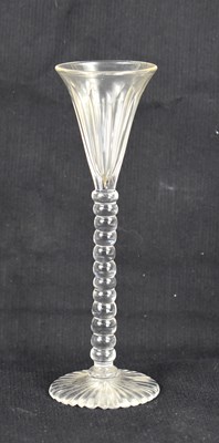 Lot 239 - A Georgian toasting glass with bobbin stem, 16....