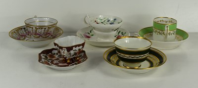 Lot 250 - A group of 19th century tea / coffee cups and...