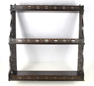 Lot 557 - A Chippendale style open fretwork mahogany...