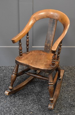 Lot 545 - A 19th century childs rocking chair with...