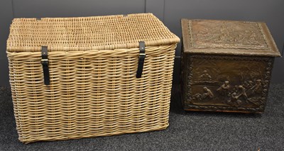 Lot 549 - A large wicker linen basket, with leather...