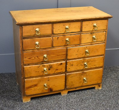 Lot 546 - An antique pine chest of drawers comprising...