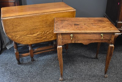 Lot 542 - A 19th century country elm lowboy with a...