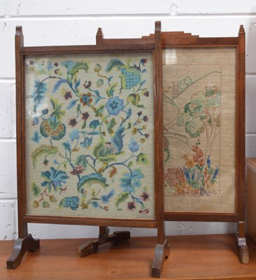 Lot 537 - Two 1940s firescreen one a displaying a...