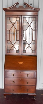 Lot 540 - An Edwardian bureau bookcase with glazed upper...