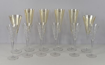 Lot 191 - A set of six cut glass champagne flutes, in a...