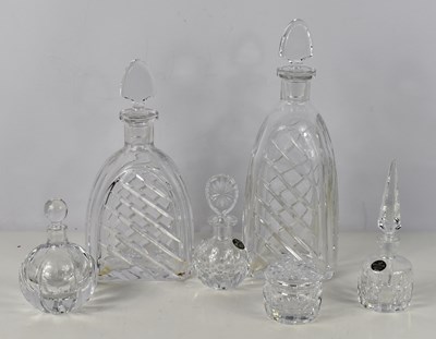 Lot 192 - A group of five Stephens glass decanters,...