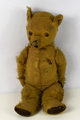 Lot 246 - An antique excelsior filled growler teddy bear,...