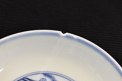 Lot 25 - A Chinese blue and white dish, painted with...