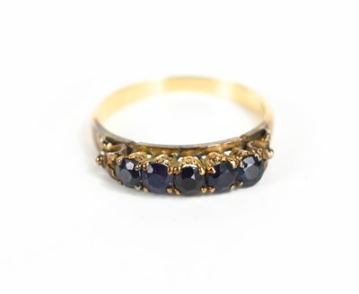 Lot 153 - A 12ct gold and sapphire five stone ring, the...