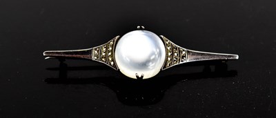 Lot 224 - An Art Deco style moonstone, silver and...