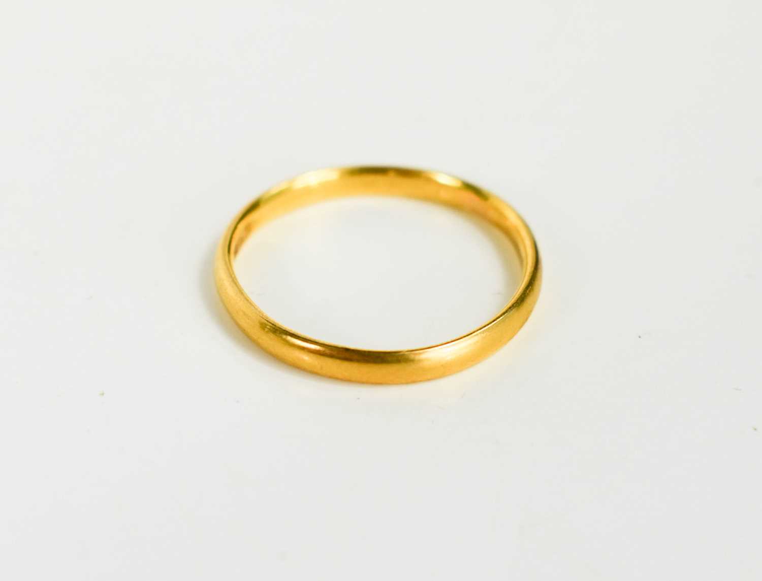 Lot 68 - A 22ct gold wedding band, size J, 1.6g.
