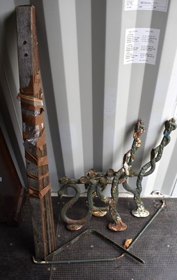 Lot 539 - A pair of cast iron and painted bench ends in...