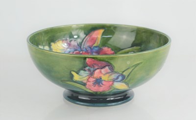 Lot 134 - A Walter Moorcroft bowl in the Orchid pattern,...