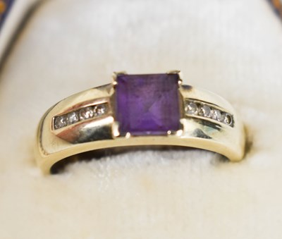 Lot 158 - A 9ct gold amethyst and diamond ring, the...