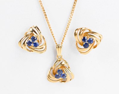 Lot 154 - A 9ct gold and sapphire pendant and matching...