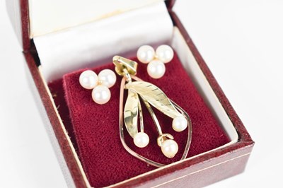 Lot 119 - A 9ct gold and pearl pendant, of spray form...