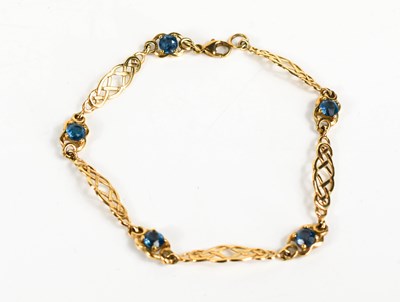 Lot 120 - A 9ct gold bracelet of five Celtic knot panels,...