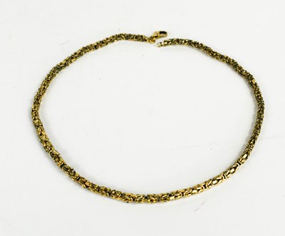 Lot 42 - A 9ct gold necklace, with crab claw clasp and...
