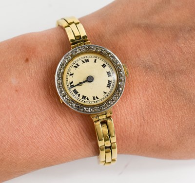 Lot 49 - An 18ct gold and diamond ladies wristwatch,...