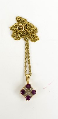Lot 52 - A 9ct gold, diamond and pink sapphire pendant...