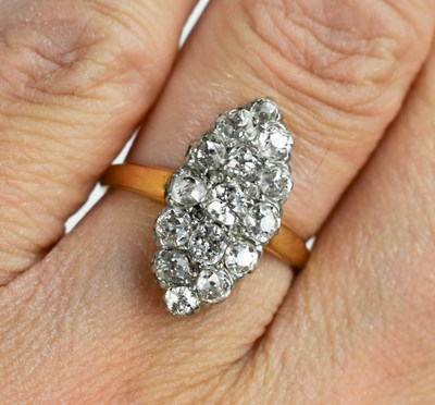 Lot 53 - An 18ct gold and diamond ring, the diamonds...
