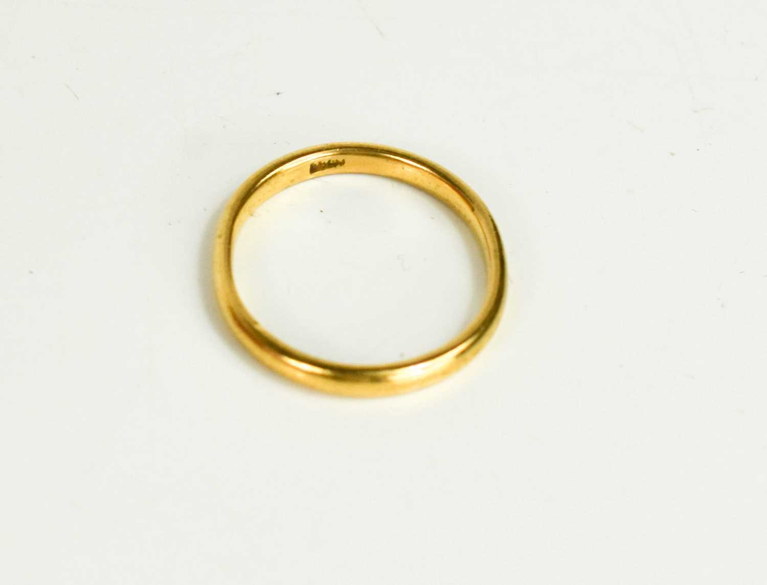 Lot 54 - A 22ct gold wedding band, 2.4g.