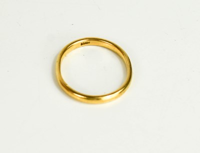 Lot 54 - A 22ct gold wedding band, 2.4g.