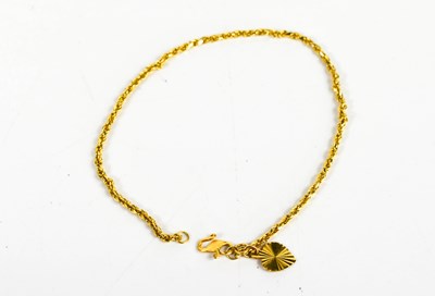 Lot 298 - A fine 22ct gold chain bracelet, with heart...