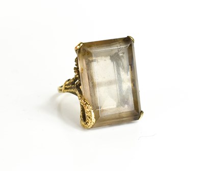 Lot 136 - A 9ct gold and smoky quartz dress ring, the...