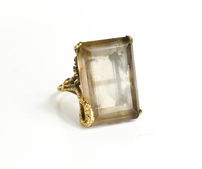 Lot 217 - A 9ct gold and smoky quartz dress ring, the...