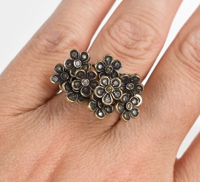 Lot 248 - An 18ct white gold flower head cluster ring,...