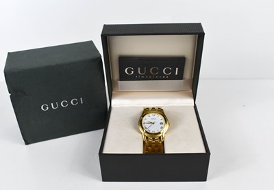 Lot 131a - A gentleman's Gucci wristwatch, the signed...