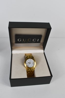Lot 131 - A gentleman's Gucci wristwatch, the signed...