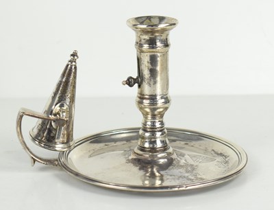 Lot 433 - A George III silver chamberstick decorated...